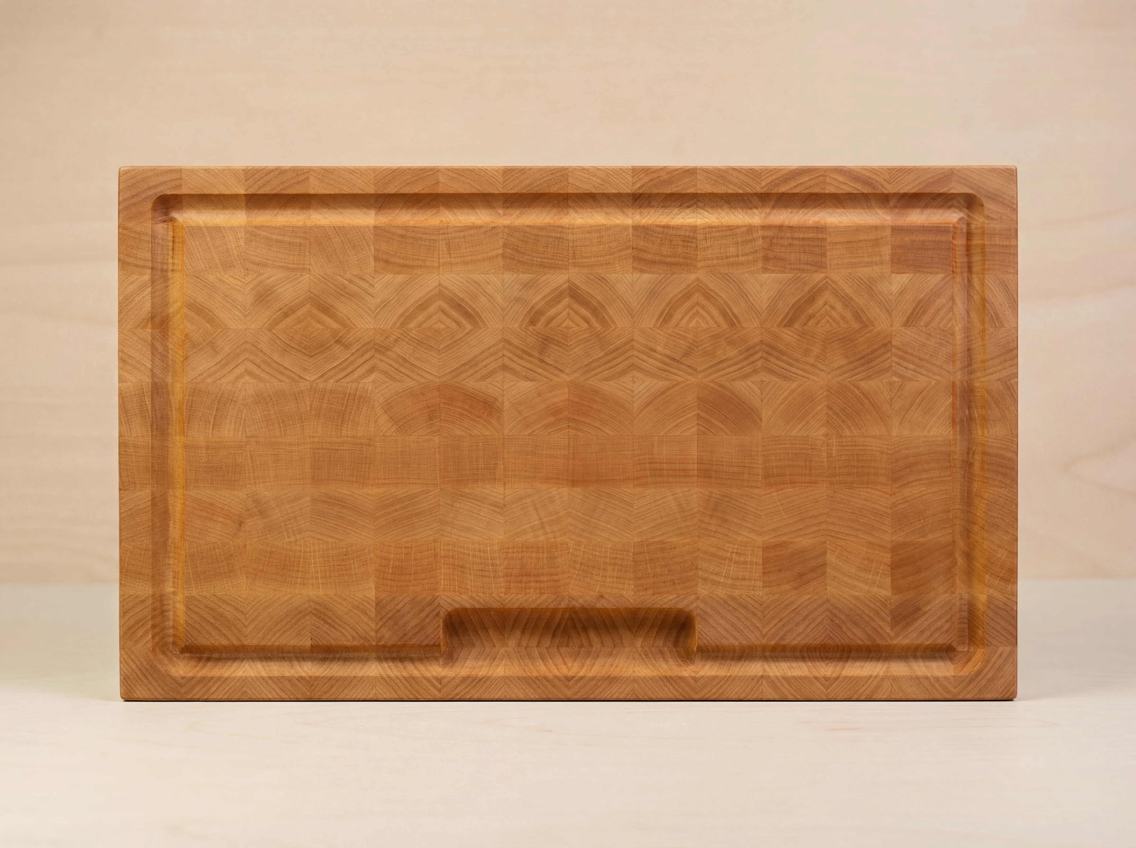 End-grain beech chopping board with chevron pattern and juice groove